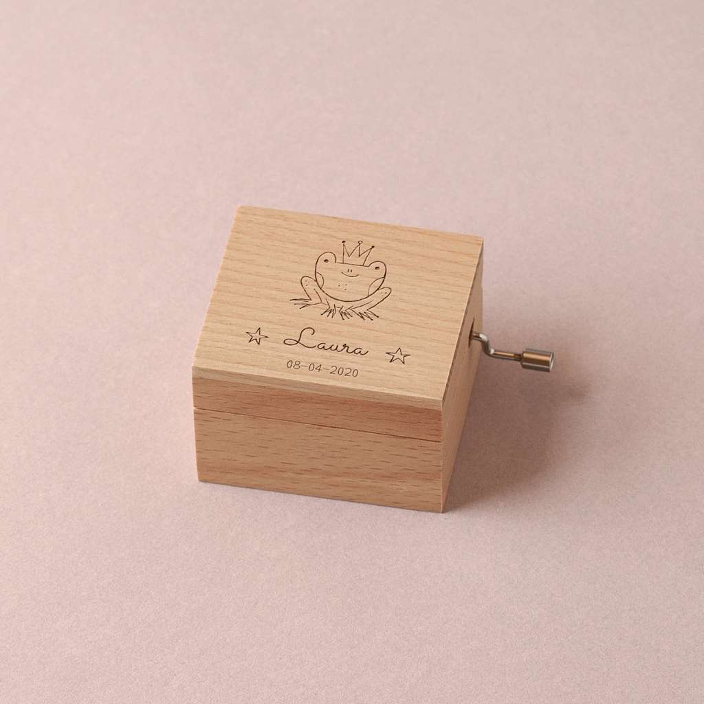 Caja musical pequeña de madera de haya Rana de cuento